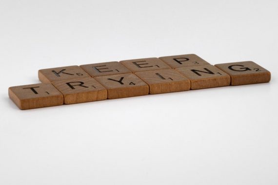scrabble, scrabble pieces, lettering, letters, wood, scrabble tiles, white background, words, quote, letters, type, typography, design, layout, focus, bokeh, blur, photography, images, image, keep trying, do the work, work, put in the hours, laziness, procrastination, nocrastination, do it, just do it, keep going, don't stop, persistence, grind, one step at a time, one foot after the other, pressing on, press on,